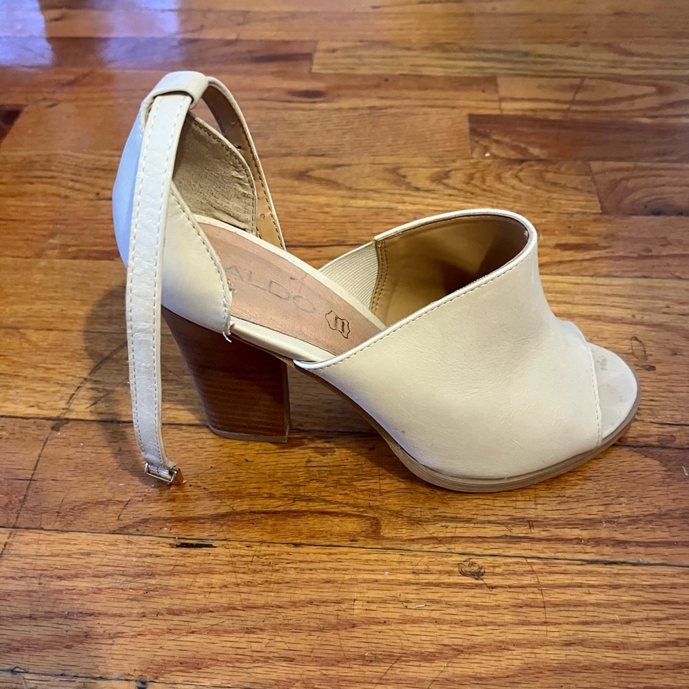 Heeled, open toed shoes in off white with adjustable ankle strap from Aldo